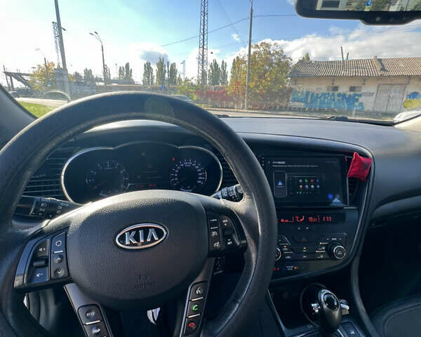 Белый Киа Оптима, объемом двигателя 2 л и пробегом 219 тыс. км за 9500 $, фото 4 на Automoto.ua