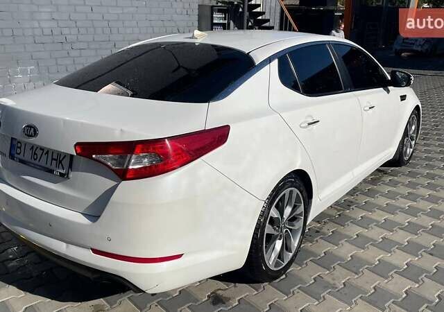 Белый Киа Оптима, объемом двигателя 2 л и пробегом 293 тыс. км за 7900 $, фото 6 на Automoto.ua
