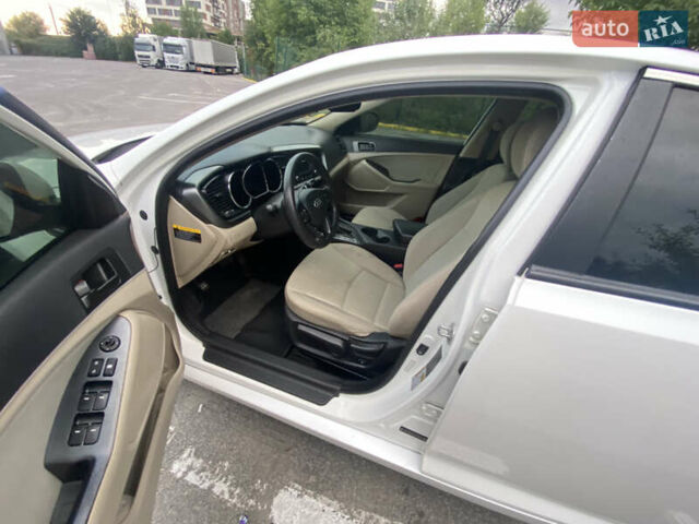 Білий Кіа Оптіма, об'ємом двигуна 2.4 л та пробігом 260 тис. км за 7800 $, фото 15 на Automoto.ua