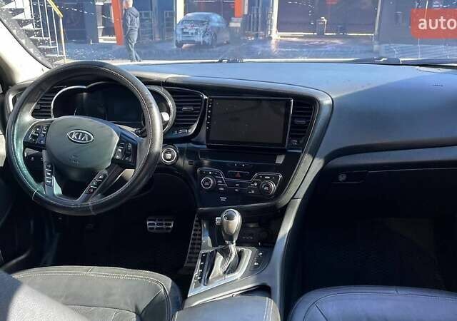 Белый Киа Оптима, объемом двигателя 2 л и пробегом 293 тыс. км за 7900 $, фото 3 на Automoto.ua