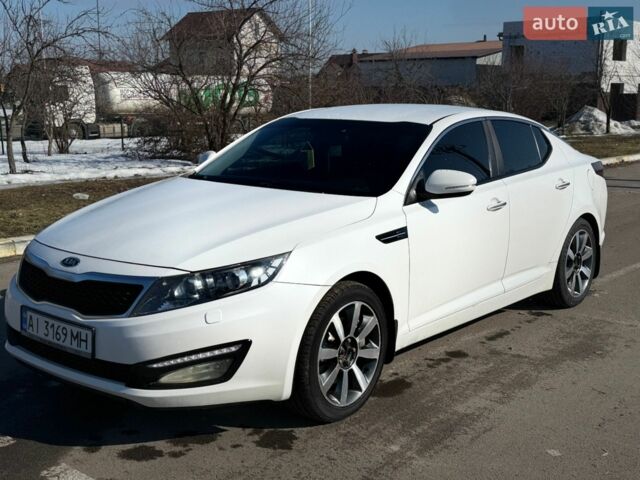 Білий Кіа Оптіма, об'ємом двигуна 2 л та пробігом 210 тис. км за 9400 $, фото 1 на Automoto.ua