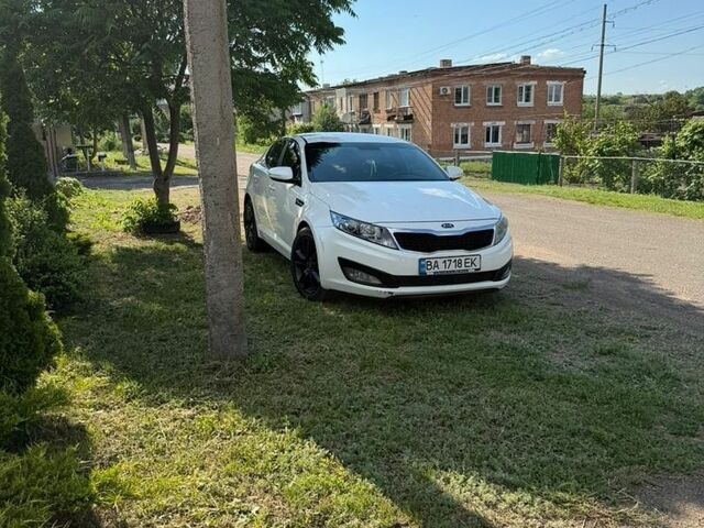 Белый Киа Оптима, объемом двигателя 2 л и пробегом 180 тыс. км за 9000 $, фото 2 на Automoto.ua