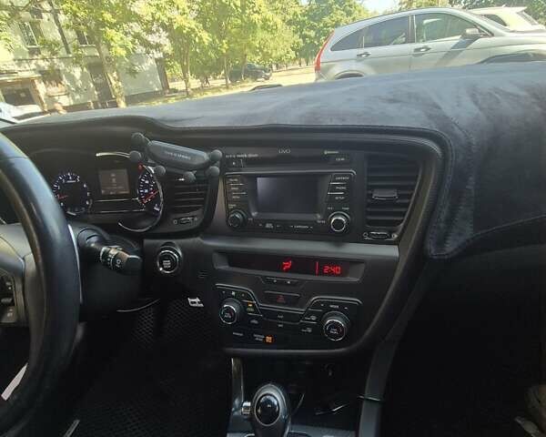 Белый Киа Оптима, объемом двигателя 2 л и пробегом 85 тыс. км за 12500 $, фото 9 на Automoto.ua