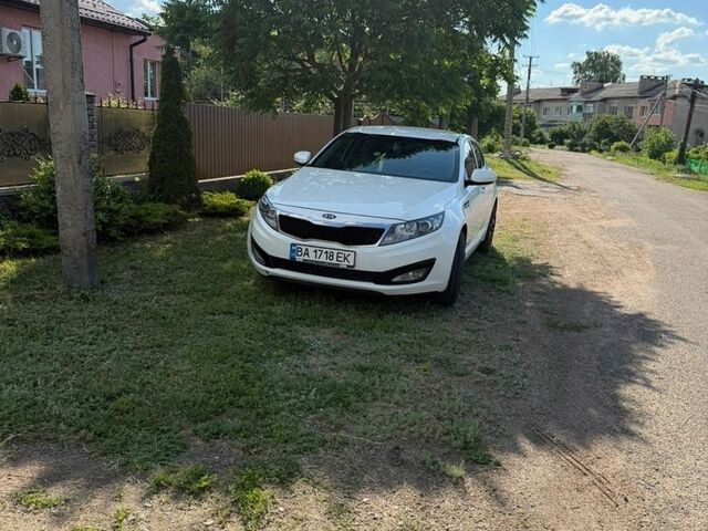 Белый Киа Оптима, объемом двигателя 2 л и пробегом 180 тыс. км за 9000 $, фото 3 на Automoto.ua