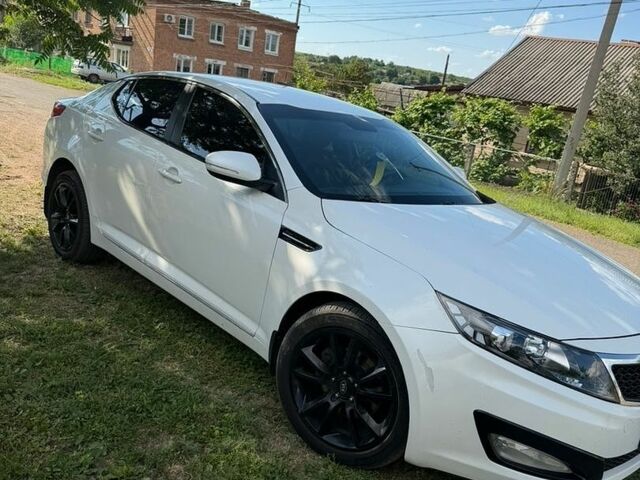 Белый Киа Оптима, объемом двигателя 2 л и пробегом 180 тыс. км за 9000 $, фото 9 на Automoto.ua