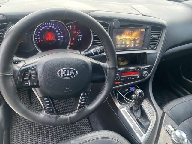 Белый Киа Оптима, объемом двигателя 2 л и пробегом 290 тыс. км за 6999 $, фото 9 на Automoto.ua