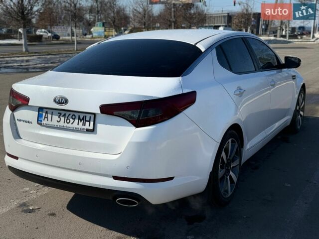 Білий Кіа Оптіма, об'ємом двигуна 2 л та пробігом 210 тис. км за 9400 $, фото 2 на Automoto.ua