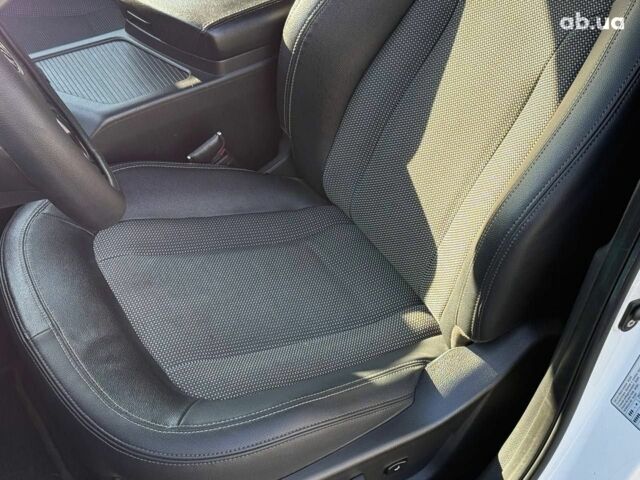 Белый Киа Оптима, объемом двигателя 2 л и пробегом 222 тыс. км за 9440 $, фото 6 на Automoto.ua