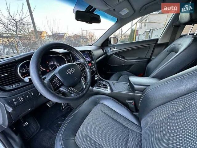 Белый Киа Оптима, объемом двигателя 2 л и пробегом 223 тыс. км за 8500 $, фото 13 на Automoto.ua