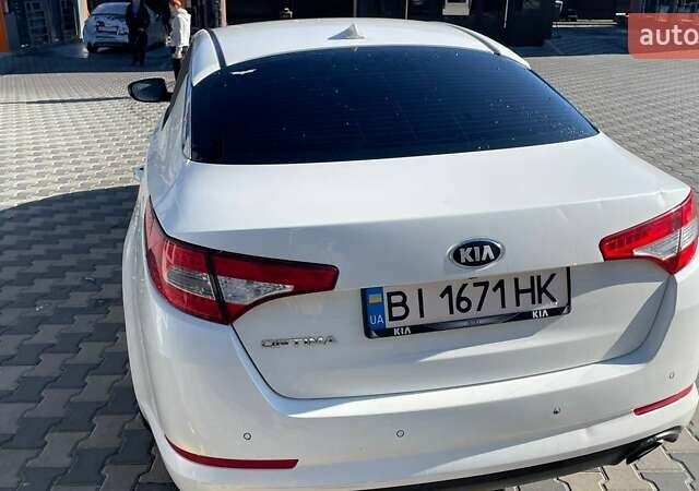 Белый Киа Оптима, объемом двигателя 2 л и пробегом 293 тыс. км за 7900 $, фото 4 на Automoto.ua
