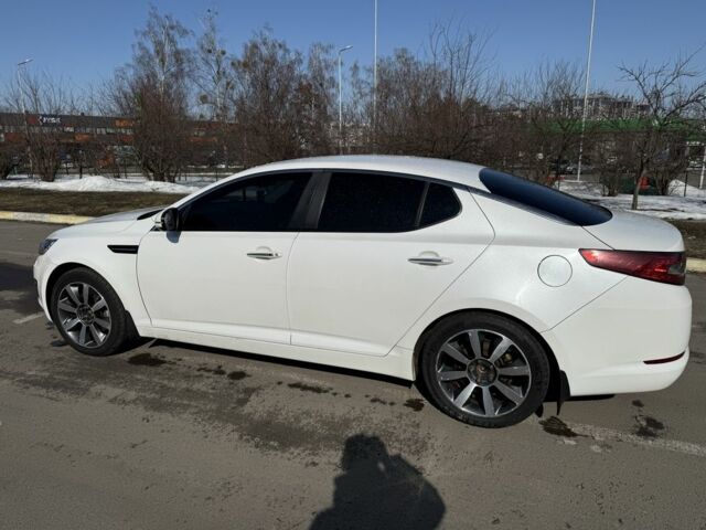 Белый Киа Оптима, объемом двигателя 2 л и пробегом 210 тыс. км за 9245 $, фото 5 на Automoto.ua