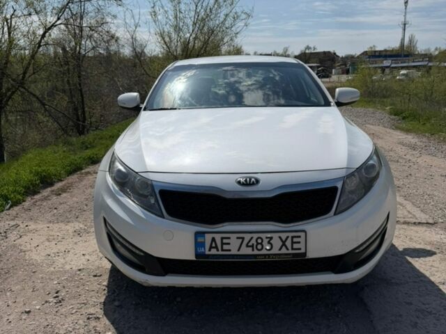 Белый Киа Оптима, объемом двигателя 2 л и пробегом 174 тыс. км за 10000 $, фото 3 на Automoto.ua