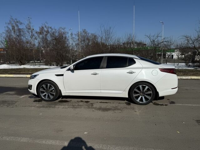 Белый Киа Оптима, объемом двигателя 2 л и пробегом 210 тыс. км за 9245 $, фото 3 на Automoto.ua