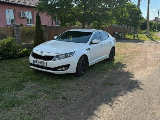 Белый Киа Оптима, объемом двигателя 2 л и пробегом 180 тыс. км за 9000 $, фото 4 на Automoto.ua