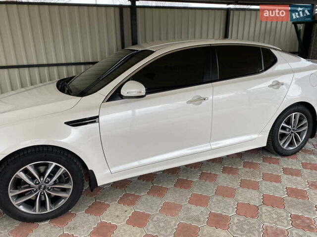 Білий Кіа Оптіма, об'ємом двигуна 2.4 л та пробігом 79 тис. км за 14500 $, фото 33 на Automoto.ua