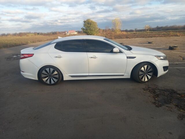 Белый Киа Оптима, объемом двигателя 2.4 л и пробегом 185 тыс. км за 9000 $, фото 5 на Automoto.ua