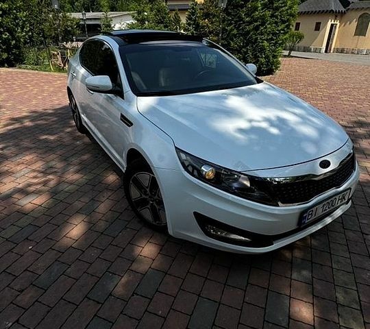 Белый Киа Оптима, объемом двигателя 2.36 л и пробегом 174 тыс. км за 9800 $, фото 1 на Automoto.ua