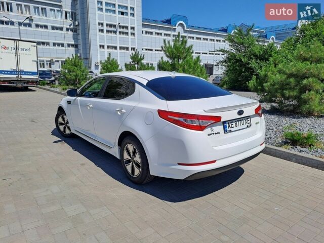 Белый Киа Оптима, объемом двигателя 2.36 л и пробегом 225 тыс. км за 9600 $, фото 4 на Automoto.ua