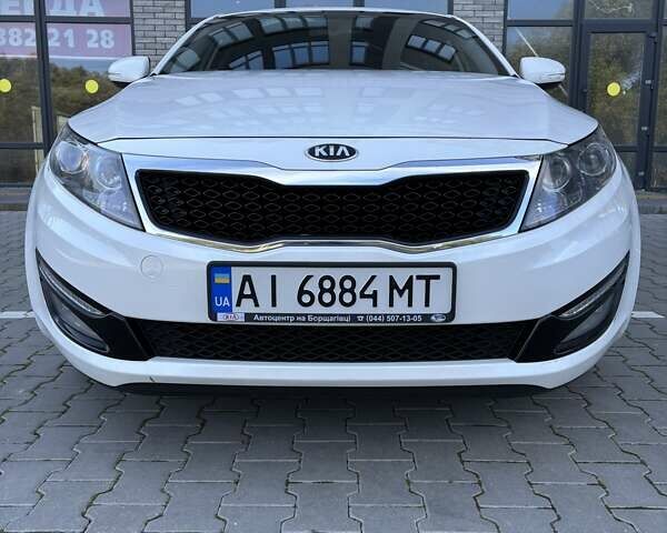 Белый Киа Оптима, объемом двигателя 2 л и пробегом 150 тыс. км за 9800 $, фото 1 на Automoto.ua