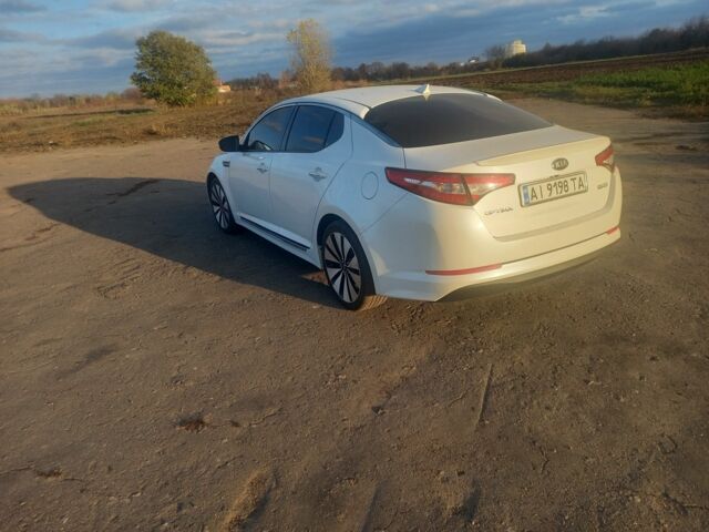 Белый Киа Оптима, объемом двигателя 2.4 л и пробегом 185 тыс. км за 9000 $, фото 1 на Automoto.ua