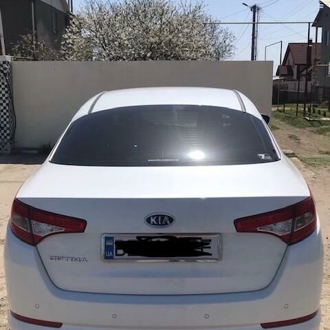 Білий Кіа Оптіма, об'ємом двигуна 2 л та пробігом 49 тис. км за 14300 $, фото 7 на Automoto.ua