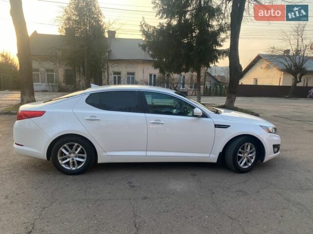 Білий Кіа Оптіма, об'ємом двигуна 2.4 л та пробігом 210 тис. км за 7500 $, фото 6 на Automoto.ua