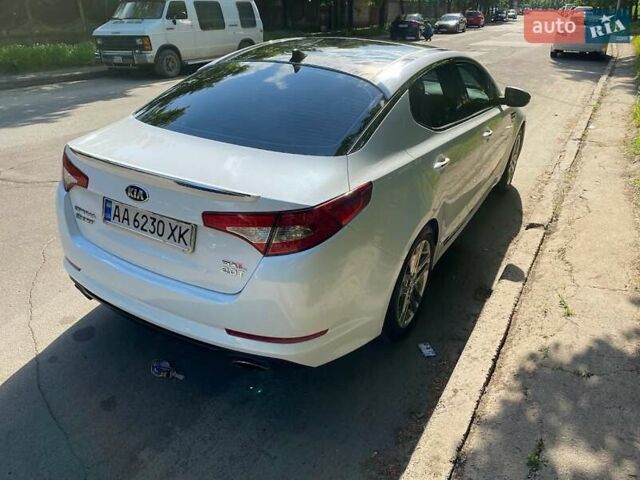 Белый Киа Оптима, объемом двигателя 2 л и пробегом 95 тыс. км за 11500 $, фото 6 на Automoto.ua
