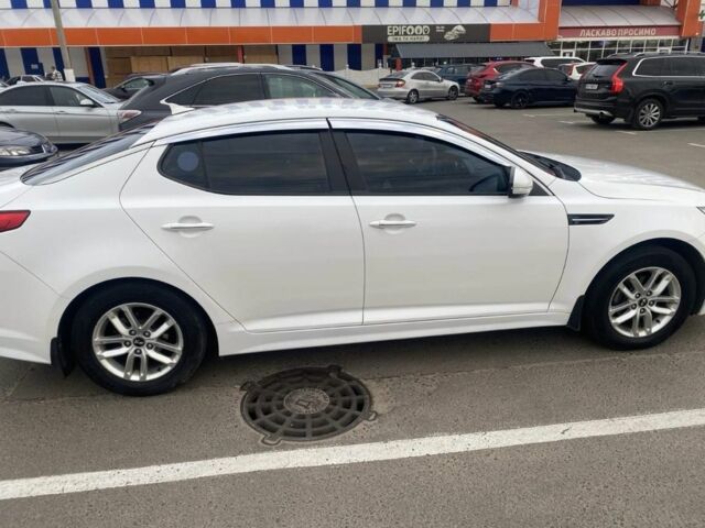 Белый Киа Оптима, объемом двигателя 2 л и пробегом 290 тыс. км за 6999 $, фото 2 на Automoto.ua