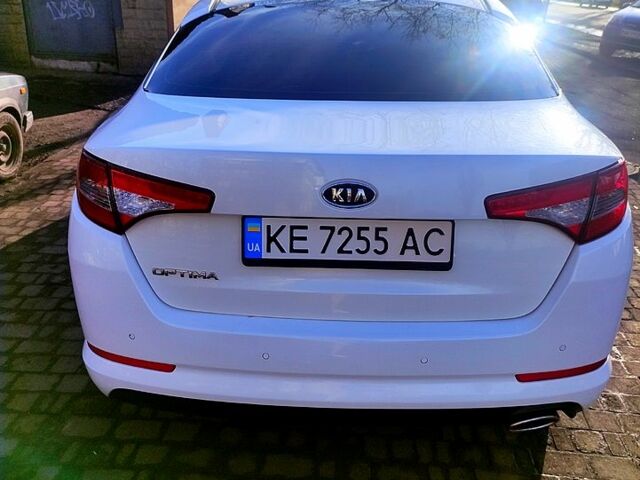 Белый Киа Оптима, объемом двигателя 2 л и пробегом 199 тыс. км за 9800 $, фото 4 на Automoto.ua