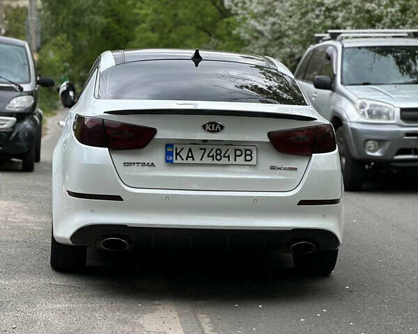 Белый Киа Оптима, объемом двигателя 2 л и пробегом 156 тыс. км за 12800 $, фото 8 на Automoto.ua