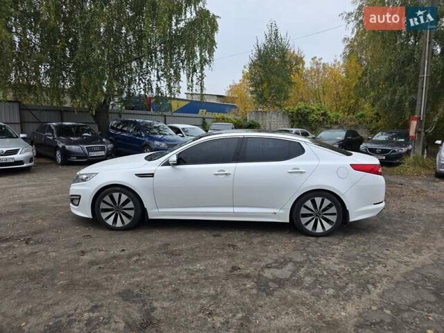 Белый Киа Оптима, объемом двигателя 2.36 л и пробегом 207 тыс. км за 8900 $, фото 8 на Automoto.ua