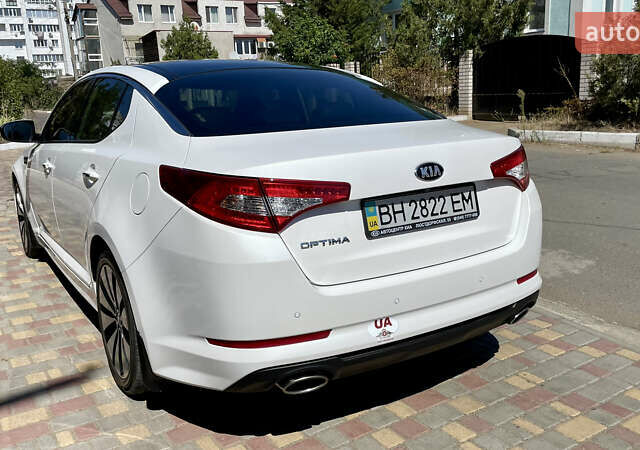 Білий Кіа Оптіма, об'ємом двигуна 2.36 л та пробігом 160 тис. км за 12150 $, фото 16 на Automoto.ua