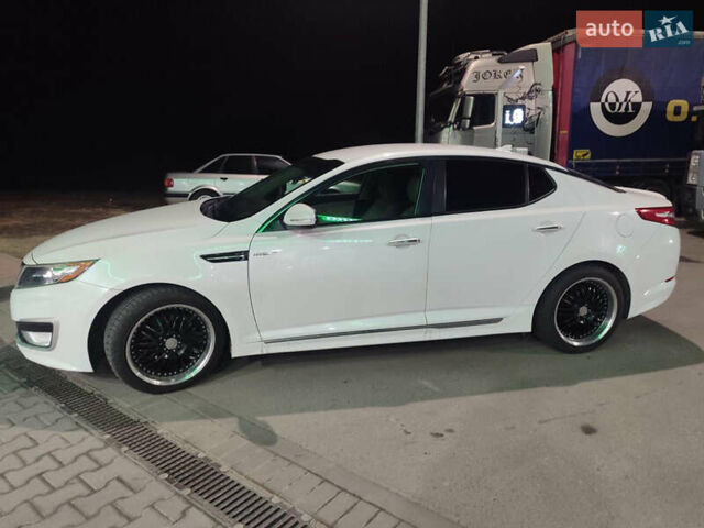 Білий Кіа Оптіма, об'ємом двигуна 2.36 л та пробігом 261 тис. км за 9500 $, фото 2 на Automoto.ua