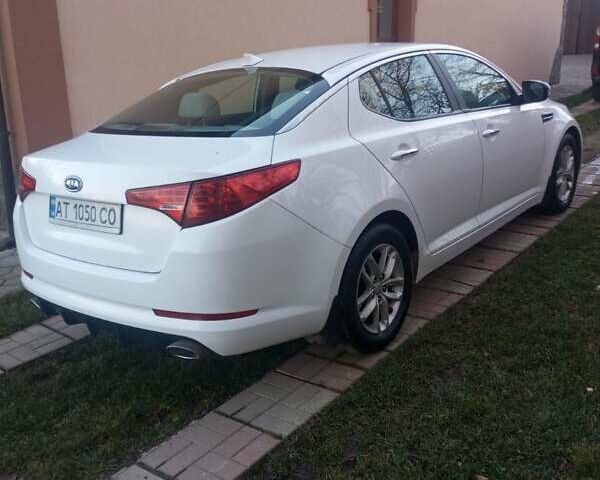 Білий Кіа Оптіма, об'ємом двигуна 2.36 л та пробігом 118 тис. км за 9300 $, фото 2 на Automoto.ua