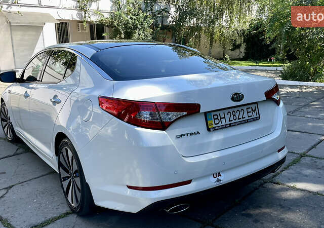 Білий Кіа Оптіма, об'ємом двигуна 2.36 л та пробігом 160 тис. км за 12150 $, фото 61 на Automoto.ua