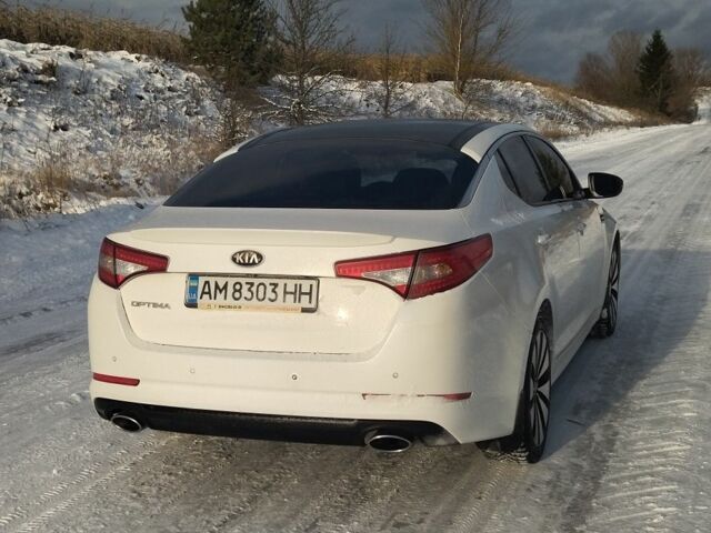 Білий Кіа Оптіма, об'ємом двигуна 2.4 л та пробігом 213 тис. км за 254 $, фото 3 на Automoto.ua