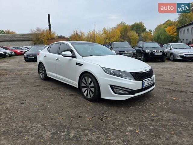 Белый Киа Оптима, объемом двигателя 2.36 л и пробегом 207 тыс. км за 8900 $, фото 2 на Automoto.ua