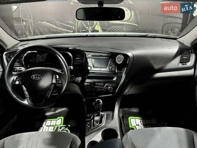Білий Кіа Оптіма, об'ємом двигуна 2.36 л та пробігом 166 тис. км за 8999 $, фото 20 на Automoto.ua