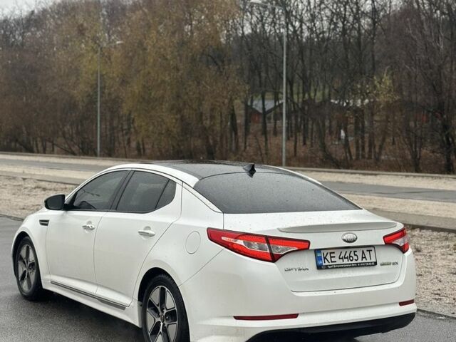 Білий Кіа Оптіма, об'ємом двигуна 2.4 л та пробігом 170 тис. км за 9800 $, фото 5 на Automoto.ua