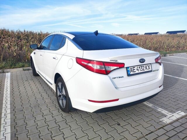 Белый Киа Оптима, объемом двигателя 2.4 л и пробегом 142 тыс. км за 10481 $, фото 2 на Automoto.ua