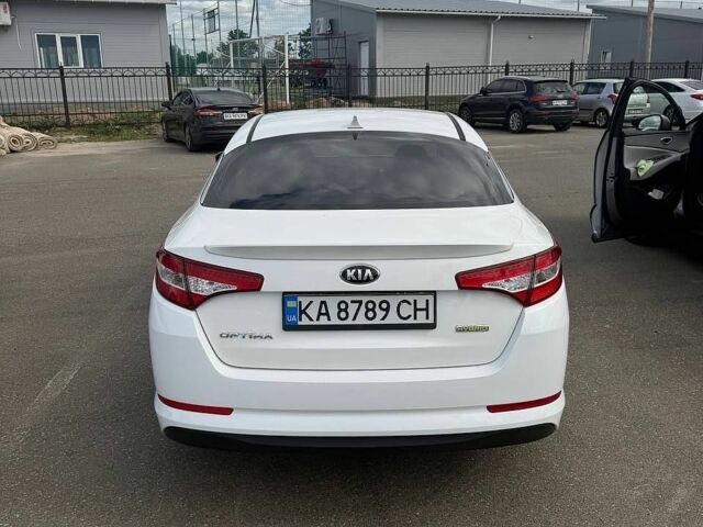 Білий Кіа Оптіма, об'ємом двигуна 2.36 л та пробігом 240 тис. км за 9100 $, фото 5 на Automoto.ua