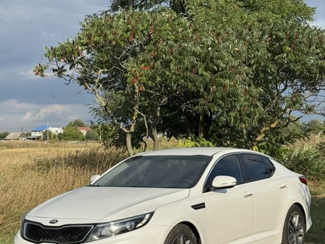 Білий Кіа Оптіма, об'ємом двигуна 2 л та пробігом 197 тис. км за 9498 $, фото 1 на Automoto.ua