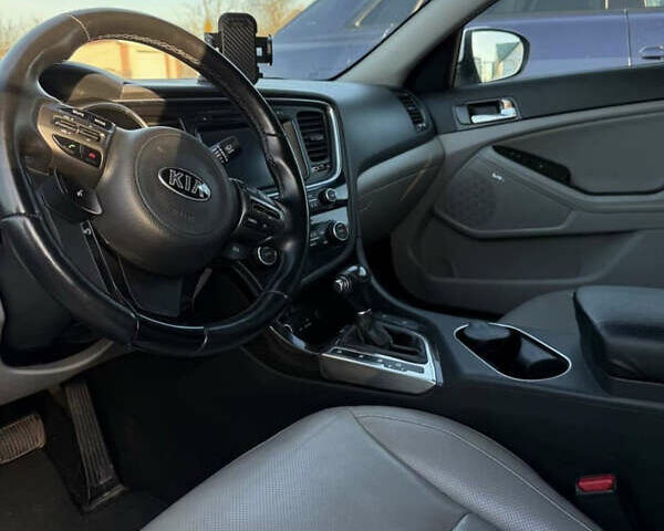 Білий Кіа Оптіма, об'ємом двигуна 2.36 л та пробігом 180 тис. км за 11000 $, фото 8 на Automoto.ua