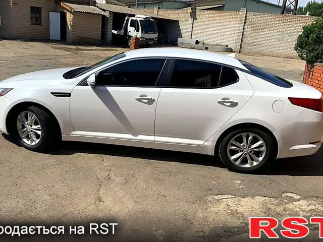 Белый Киа Оптима, объемом двигателя 2.4 л и пробегом 197 тыс. км за 9000 $, фото 1 на Automoto.ua