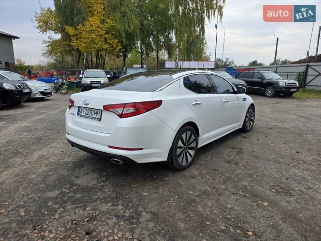 Белый Киа Оптима, объемом двигателя 2.36 л и пробегом 207 тыс. км за 8900 $, фото 4 на Automoto.ua