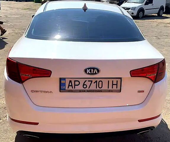 Белый Киа Оптима, объемом двигателя 2.4 л и пробегом 197 тыс. км за 9000 $, фото 3 на Automoto.ua