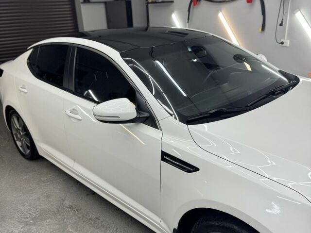 Белый Киа Оптима, объемом двигателя 2 л и пробегом 260 тыс. км за 8500 $, фото 5 на Automoto.ua