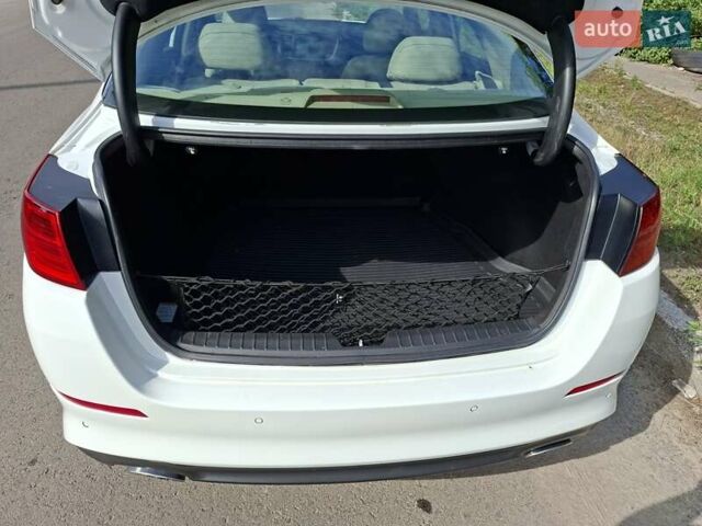 Белый Киа Оптима, объемом двигателя 2.36 л и пробегом 175 тыс. км за 9500 $, фото 4 на Automoto.ua