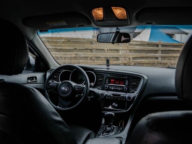 Белый Киа Оптима, объемом двигателя 2 л и пробегом 213 тыс. км за 8300 $, фото 3 на Automoto.ua