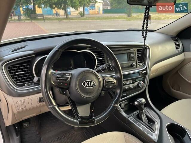 Білий Кіа Оптіма, об'ємом двигуна 2.4 л та пробігом 115 тис. км за 12000 $, фото 6 на Automoto.ua